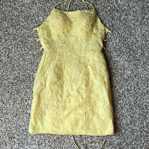 Yellow Floral/flowerly imprinted Formal dress. Mid thigh length